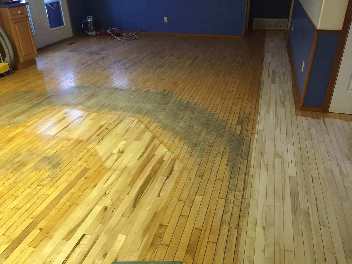 Water-marked boards part-way through sanding